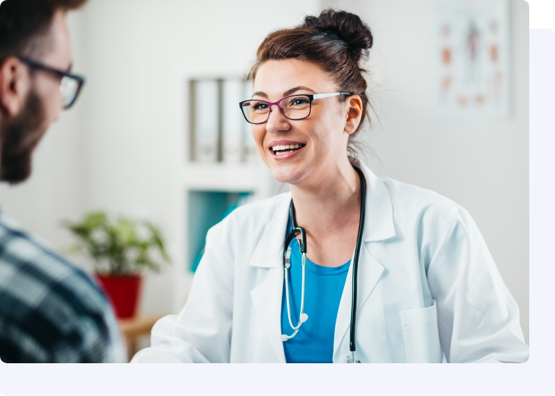 smiling doctor talking with patient